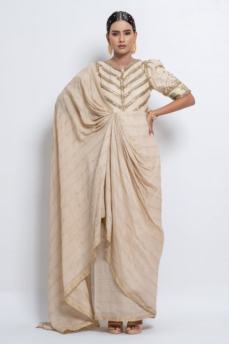 Abstract By Megha Jain Madaan Off White Handloom Cotton Sequin Embellished Yoke Saree Gown at Aza Fashions Abstract By Megha Jain Madaan_Off White Handloom Cotton Sequin Embellished Yoke Saree Gown _at_Aza_Fashions