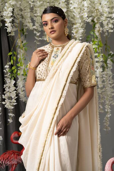 Abstract By Megha Jain Madaan Off White Georgette, Silk Sequins, Beads, Floral Embellished Saree Gown Online at Aza Fashions Abstract By Megha Jain Madaan_Off White Georgette, Silk Sequins, Beads, Floral Embellished Saree Gown _Online_at_Aza_Fashions