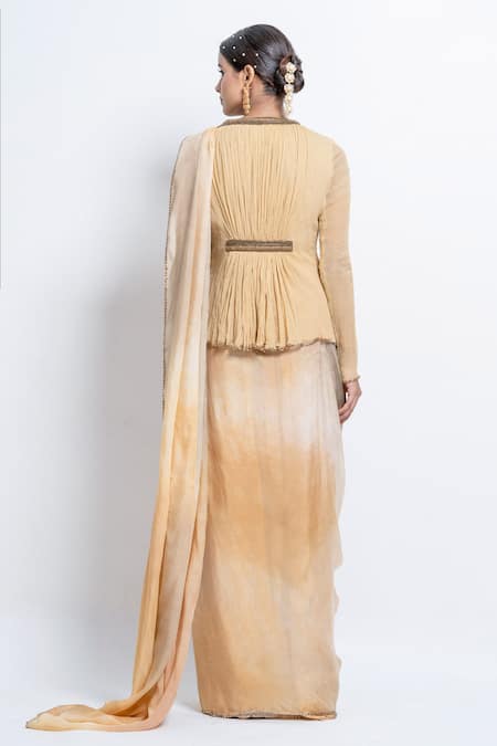 Shop Abstract By Megha Jain Madaan Peach Chiffon, Flannel Sequins Round Pre-stitched Saree With Pleat Detail Top at Aza Fashions Shop_Abstract By Megha Jain Madaan_Peach Chiffon, Flannel Sequins Round Pre-stitched Saree With Pleat Detail Top _at_Aza_Fashions