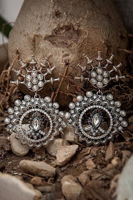 Shop Neeta Boochra Silver Plated Crystals, Stones Floral Cut Work Statement Earrings at Aza Fashions Shop_Neeta Boochra_Silver Plated Crystals, Stones Floral Cut Work Statement Earrings _at_Aza_Fashions