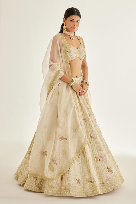 Shop Shyam Narayan Prasad White Silk, Organza Zari, Tassels V-neck Work And Floral Print Bridal Lehenga Set at Aza Fashions Shop_Shyam Narayan Prasad_White Silk, Organza Zari, Tassels V-neck Work And Floral Print Bridal Lehenga Set _at_Aza_Fashions