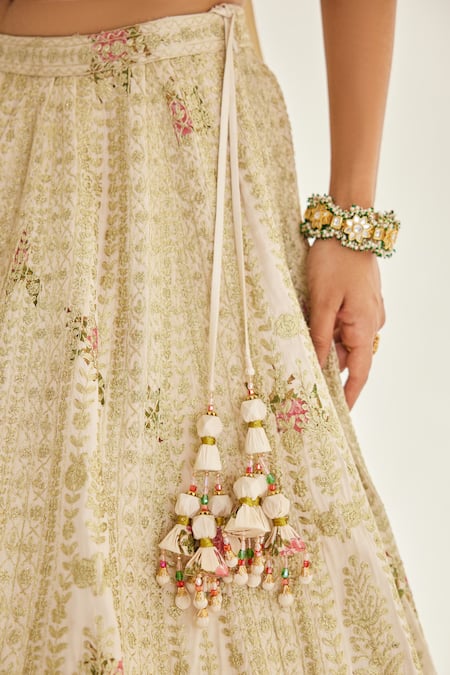 Shop Shyam Narayan Prasad White Silk, Organza Zari, Tassels V-neck Work And Floral Print Bridal Lehenga Set Online at Aza Fashions Shop_Shyam Narayan Prasad_White Silk, Organza Zari, Tassels V-neck Work And Floral Print Bridal Lehenga Set _Online_at_Aza_Fashions
