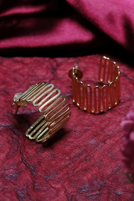 Shop Ishhaara Gold Plated Zig Zag Pattern Hoops at Aza Fashions Shop_Ishhaara_Gold Plated Zig Zag Pattern Hoops _at_Aza_Fashions