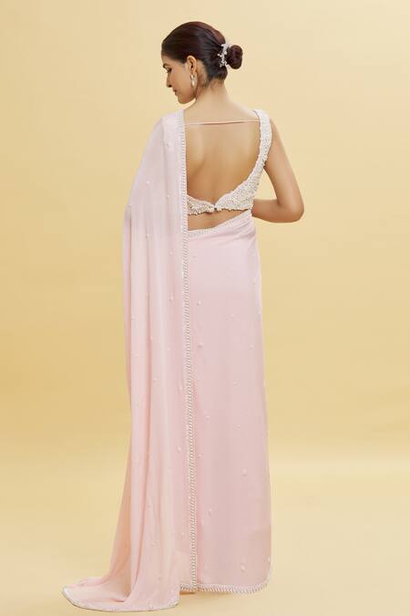 Shop Shlok Design Pink Chiffon Embellished Pearls V Neck Work Saree With Blouse at Aza Fashions Shop_Shlok Design_Pink Chiffon Embellished Pearls V Neck Work Saree With Blouse _at_Aza_Fashions