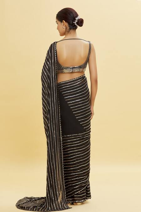 Shop Shlok Design Black Georgette Embroidery Linear Grid Pattern Saree With Blouse at Aza Fashions Shop_Shlok Design_Black Georgette Embroidery Linear Grid Pattern Saree With Blouse _at_Aza_Fashions