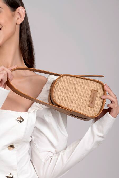 Shop_X Feet Above_Brown Woven Berlin Jute Egg Shaped Bag _Online_at_Aza_Fashions