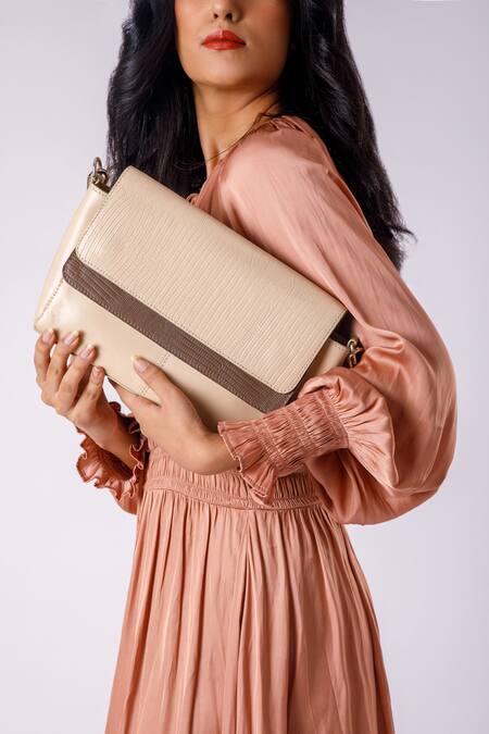 Shop X Feet Above Cream Textured Mimosa Leather Baguette Online at Aza Fashions Shop_X Feet Above_Cream Textured Mimosa Leather Baguette _Online_at_Aza_Fashions