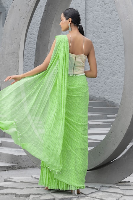 Shop Chhavvi Aggarwal Green Georgette, Net Beads, Cut Geometric Print Pre-draped Saree With Blouse at Aza Fashions Shop_Chhavvi Aggarwal_Green Georgette, Net Beads, Cut Geometric Print Pre-draped Saree With Blouse _at_Aza_Fashions