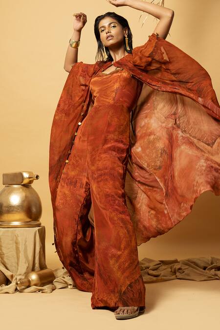 Shop Label Shristi Chetani Orange Crepe, Georgette Embroidery, Tassels Sweetheart Hand Cape And Jumpsuit Set at Aza Fashions Shop_Label Shristi Chetani_Orange Crepe, Georgette Embroidery, Tassels Sweetheart Hand Cape And Jumpsuit Set_at_Aza_Fashions