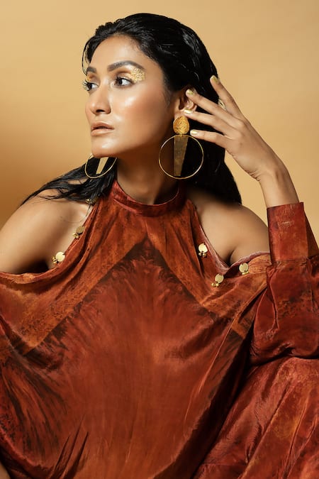 Label Shristi Chetani_Orange Crepe Tassels, Embroidery Halter Abstract Pattern Top And Flared Pant Set _at_Aza_Fashions