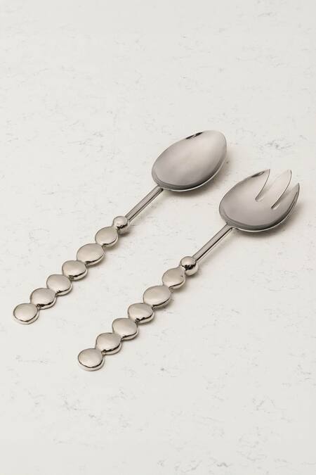 Shop Elm & Oak Silver Stainless Steel Head And Aluminium Handle Pebble Salad Server Set Of 2 at Aza Fashions Shop_Elm & Oak_Silver Stainless Steel Head And Aluminium Handle Pebble Salad Server Set Of 2_at_Aza_Fashions