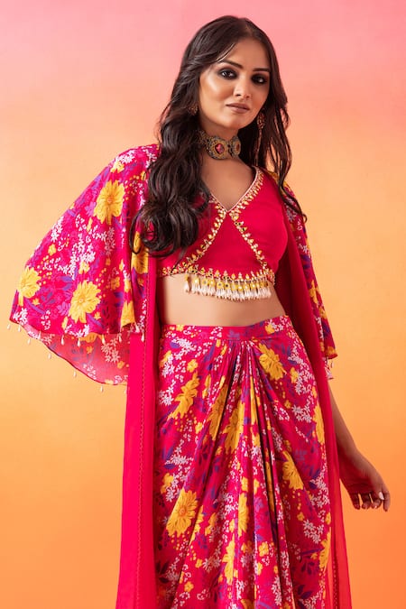 Buy Seema Thukral Pink Georgette, Crepe Tassels V-neck Floral Print Cape And Skirt Set Online at Aza Fashions Buy_Seema Thukral_Pink Georgette, Crepe Tassels V-neck Floral Print Cape And Skirt Set _Online_at_Aza_Fashions