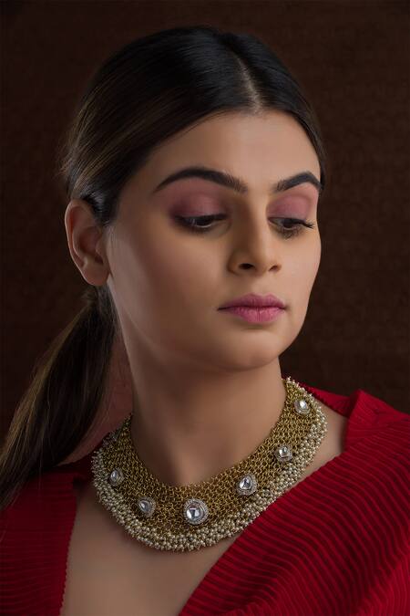 Vasundhara Gold Plated Cubic Zirconia Stone Embellished Necklace Online at Aza Fashions Vasundhara_Gold Plated Cubic Zirconia Stone Embellished Necklace _Online_at_Aza_Fashions