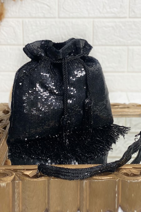 Shop Kainiche By Mehak Black Embroidery Sequin Potli at Aza Fashions Shop_Kainiche By Mehak_Black Embroidery Sequin Potli _at_Aza_Fashions