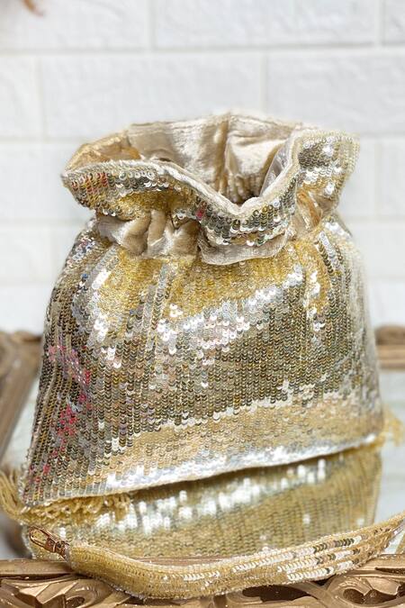 Kainiche By Mehak Gold Embroidery Linear Pattern Potli Online at Aza Fashions Kainiche By Mehak_Gold Embroidery Linear Pattern Potli _Online_at_Aza_Fashions