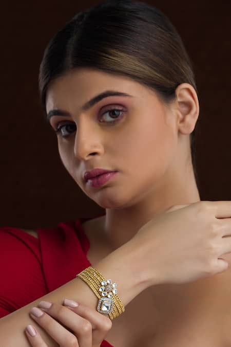 Vasundhara Gold Plated Crystals, Diamonds Geometric Kundan And Cubic Zirconia Bracelet 