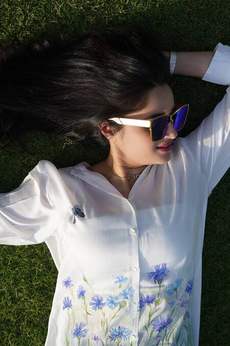 Shop Kyra By Nina + Deepika White Modal, Satin Collared Cornflower Symphony Hand Painted Shirt Online at Aza Fashions Shop_Kyra By Nina + Deepika_White Modal, Satin Collared Cornflower Symphony Hand Painted Shirt _Online_at_Aza_Fashions