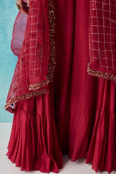 Shop Siyona By Ankurita Red Silk, Chiffon Sequins Asymmetric Embroidered Cape And Layered Sharara Set Online at Aza Fashions Shop_Siyona By Ankurita_Red Silk, Chiffon Sequins Asymmetric Embroidered Cape And Layered Sharara Set _Online_at_Aza_Fashions