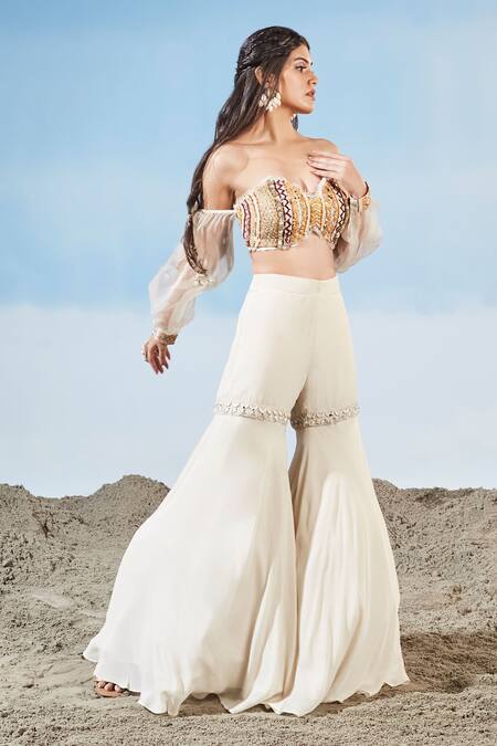 Buy Siyona By Ankurita Ivory Chinnon Embrodiered Geometric Off Shoulder Bustier And Sharara Set Online at Aza Fashions Buy_Siyona By Ankurita_Ivory Chinnon Embrodiered Geometric Off Shoulder Bustier And Sharara Set _Online_at_Aza_Fashions