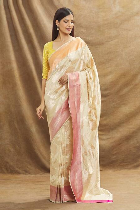 Resa By Ushnakmals_Ivory Katan Silk Woven Lotus Motif Saree_at_Aza_Fashions
