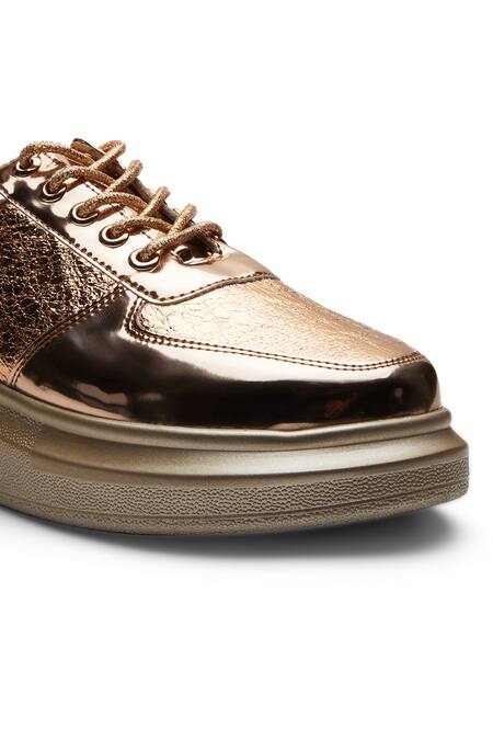 Anaar_Gold Textured Panel Lace Up Sneakers _at_Aza_Fashions