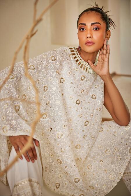 Shop Twenty Nine White Flared Chikankari Asymmetric Cape Online at Aza Fashions Shop_Twenty Nine_White Flared Chikankari Asymmetric Cape _Online_at_Aza_Fashions