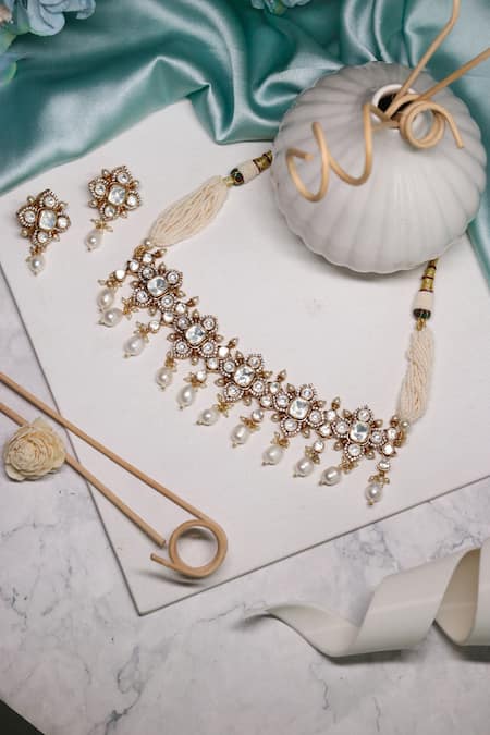 Shop Ishhaara Gold Plated Beads Floral Kundan Stone Embellished Choker Necklace Set at Aza Fashions Shop_Ishhaara_Gold Plated Beads Floral Kundan Stone Embellished Choker Necklace Set _at_Aza_Fashions