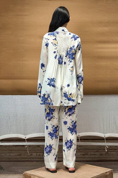 Shop Amka Ivory Silk Hibiscus Printed Wide Legged Pant at Aza Fashions Shop_Amka_Ivory Silk Hibiscus Printed Wide Legged Pant_at_Aza_Fashions