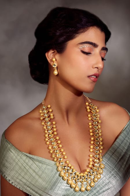 Buy Gold Plated Kundan Long Necklace by Paisley Pop Online at Aza Fashions.