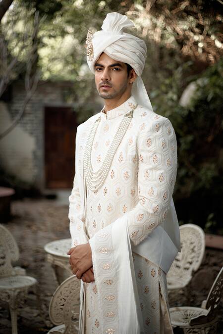 Ankit V Kapoor_Ivory Cotton, Silk Embroidery, Gota Patti Fahad Thread Sherwani Set_at_Aza_Fashions