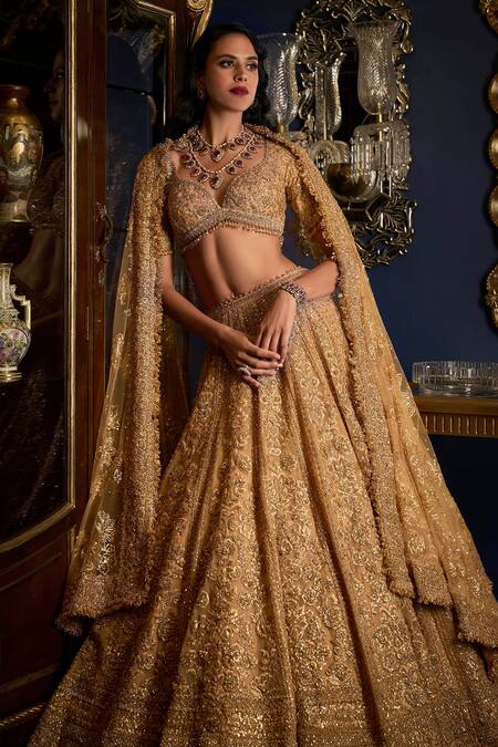 Shop_Seema Gujral_Gold Net Crystals, Sequins, Beads, Embroidery Flower Bridal Lehenga Set _Online_at_Aza_Fashions