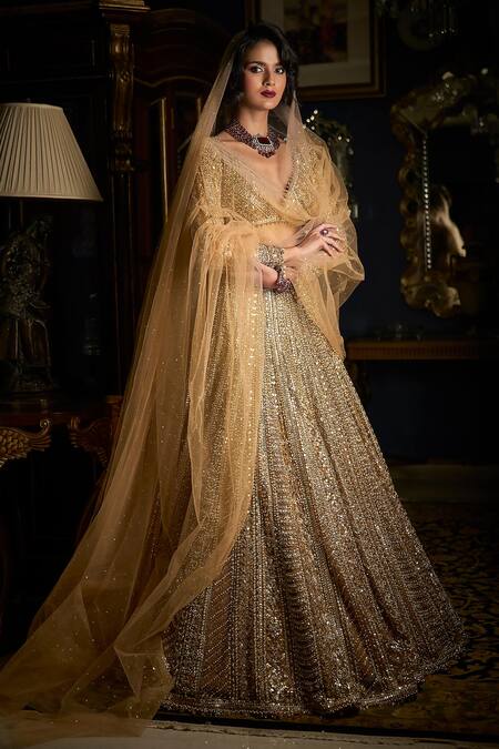 Seema Gujral_Gold Net Beads, Pearls, Sequins Plunge Mirror And Embroidered Bridal Lehenga Set_Online_at_Aza_Fashions