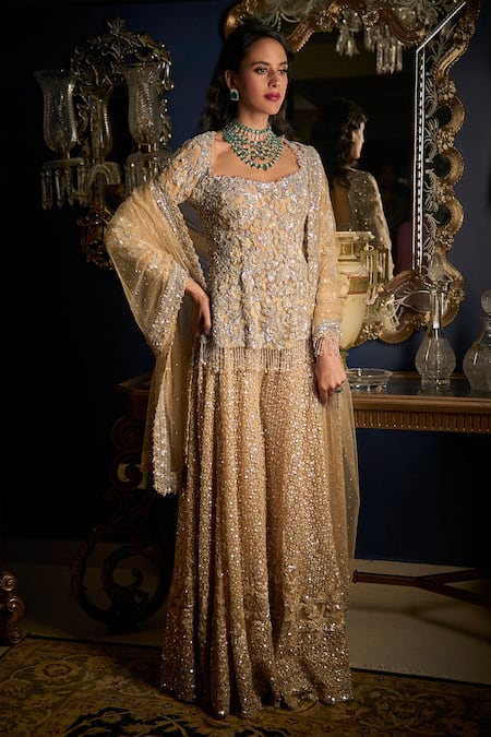 Seema Gujral Beige Net Embroidered Cutdana Broad Cut And Sequin Kurta Sharara Set  