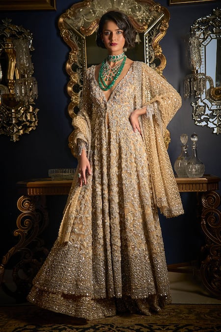 Seema Gujral Beige Net Embroidered Cutdana Deep V Cut And Sequin Jacket Sharara Set  