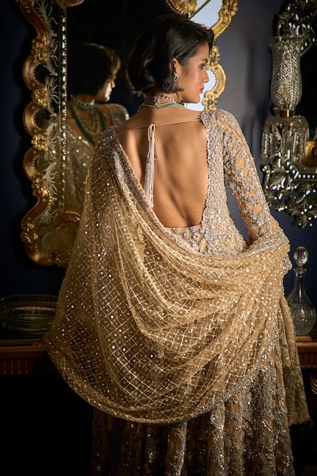 Seema Gujral_Beige Net Sequins, Beads, Cut Work V-neck Dana And Embroidered Jacket Sharara Set _Online_at_Aza_Fashions