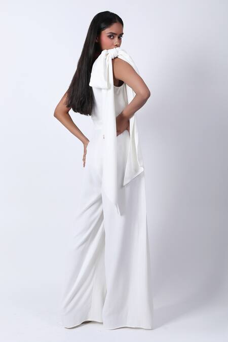 Shop Swatee Singh Ivory Crepe Asymmetric Bow Detail Jumpsuit Online at Aza Fashions Shop_Swatee Singh_Ivory Crepe Asymmetric Bow Detail Jumpsuit _Online_at_Aza_Fashions