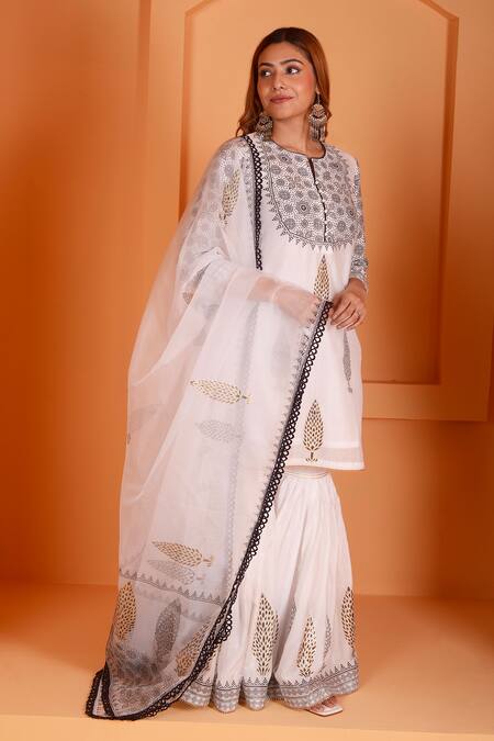 Shop_Abbaran_Ivory Chanderi, Cotton, Organza Floral Blossom Block Print Kurta Gharara Set _Online_at_Aza_Fashions