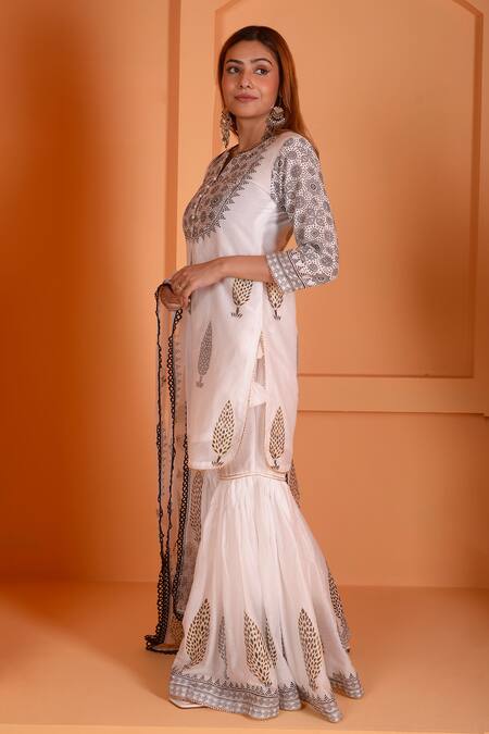 Abbaran_Ivory Chanderi, Cotton, Organza Floral Blossom Block Print Kurta Gharara Set _at_Aza_Fashions