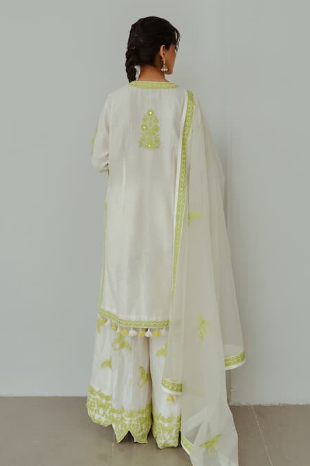 Shop Wabi Sabi By Anshum-Ritesh Ivory Chanderi Embroidery, Tassels Collared Titli Hand Kurta Sharara Set at Aza Fashions Shop_Wabi Sabi By Anshum-Ritesh_Ivory Chanderi Embroidery, Tassels Collared Titli Hand Kurta Sharara Set _at_Aza_Fashions