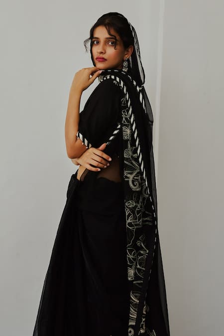 Wabi Sabi By Anshum-Ritesh Black Organza Tassels, Embroidery V-neck Lotus Pond Saree With Blouse Online at Aza Fashions Wabi Sabi By Anshum-Ritesh_Black Organza Tassels, Embroidery V-neck Lotus Pond Saree With Blouse _Online_at_Aza_Fashions