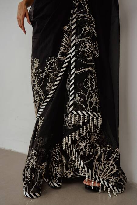 Wabi Sabi By Anshum-Ritesh Black Organza Tassels, Embroidery V-neck Lotus Pond Saree With Blouse at Aza Fashions Wabi Sabi By Anshum-Ritesh_Black Organza Tassels, Embroidery V-neck Lotus Pond Saree With Blouse _at_Aza_Fashions
