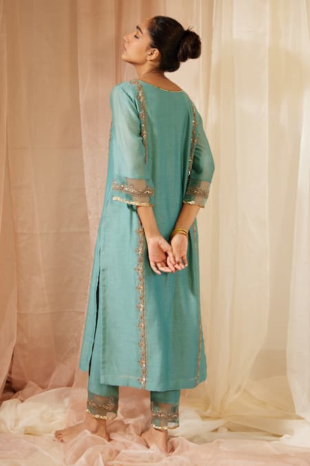 Shop Sarang Kaur Blue Chanderi Silk Sequins, Beads, Embroidery V-neck Floral Kurta And Pant Set at Aza Fashions Shop_Sarang Kaur_Blue Chanderi Silk Sequins, Beads, Embroidery V-neck Floral Kurta And Pant Set _at_Aza_Fashions