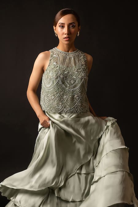 Decemberbyvivek Green Net Sequins, Beads, Cut Work Round Embroidered Top And Layered Skirt Set Online at Aza Fashions Decemberbyvivek_Green Net Sequins, Beads, Cut Work Round Embroidered Top And Layered Skirt Set _Online_at_Aza_Fashions