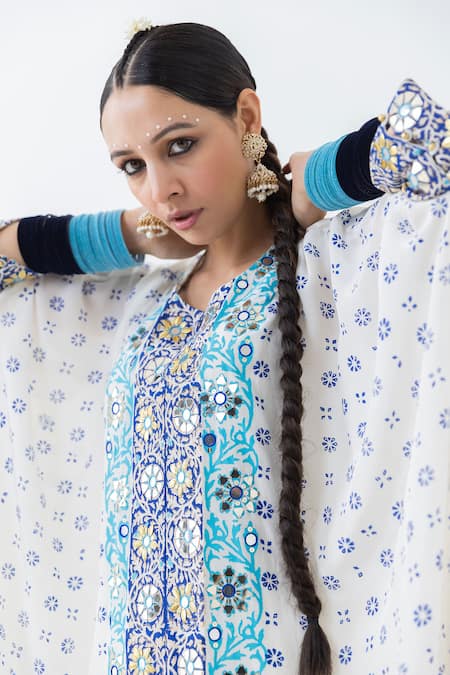 Pooja Rajgarhia Gupta Ivory Crepe, Satin Sequins, Mirrors Indu Floral Embroidered Kaftan And Trouser Set Online at Aza Fashions Pooja Rajgarhia Gupta_Ivory Crepe, Satin Sequins, Mirrors Indu Floral Embroidered Kaftan And Trouser Set _Online_at_Aza_Fashions