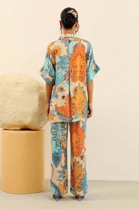 Shop Label Deepika Nagpal Blue Silk Split V-neck Heather Printed Shirt And Pant Set at Aza Fashions Shop_Label Deepika Nagpal_Blue Silk Split V-neck Heather Printed Shirt And Pant Set_at_Aza_Fashions