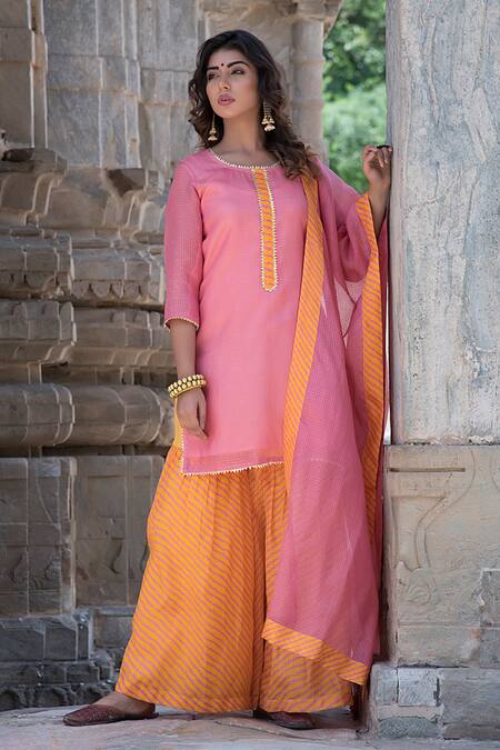 Buy The Home Affair Peach Kota Doria Patti Round Neck Leheriya Striped Gharara Kurta Set Online at Aza Fashions Buy_The Home Affair_Peach Kota Doria Patti Round Neck Leheriya Striped Gharara Kurta Set _Online_at_Aza_Fashions