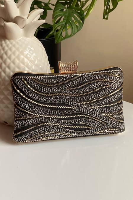 Clasp clutch sale