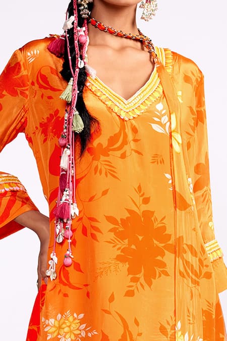 ISHA GUPTA TAYAL_Orange Crepe Sequins, Tassels V-neck Tonal Floral Print Kurta Set _Online_at_Aza_Fashions