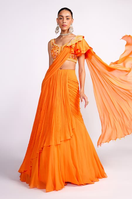 Buy_ISHA GUPTA TAYAL_Orange Crepe Sequins, Cut Work V-neck Pre-draped Saree With Embroidered Blouse _Online_at_Aza_Fashions