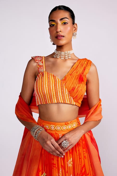 Isha Gupta Tayal_Orange Organza, Georgette, Satin Sequins, Floral Bloom Print Lehenga Set _at_Aza_Fashions
